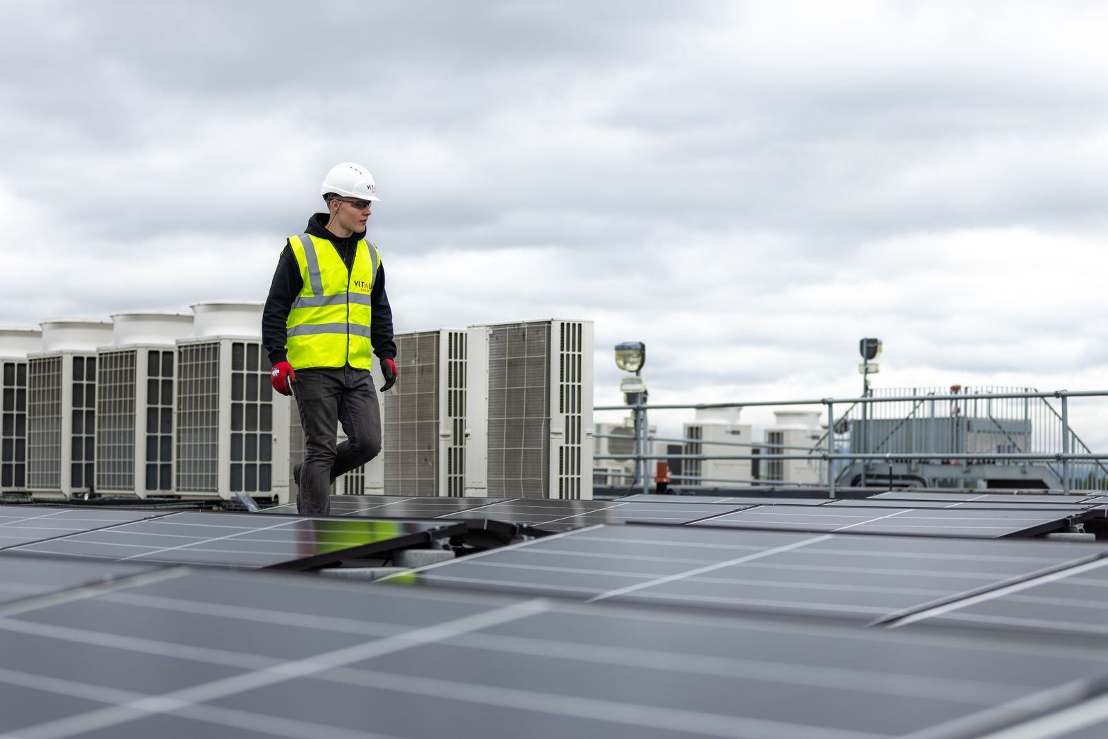 Engineer reviewing production data on site